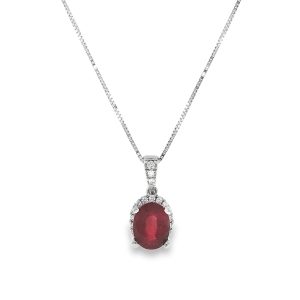 Ruby and diamond halo pendant in 18k white gold