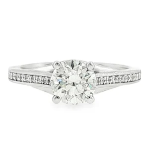 Vintage Engagement Ring with Round Brilliant Cut Diamond and Accent Stones in 18K White Gold