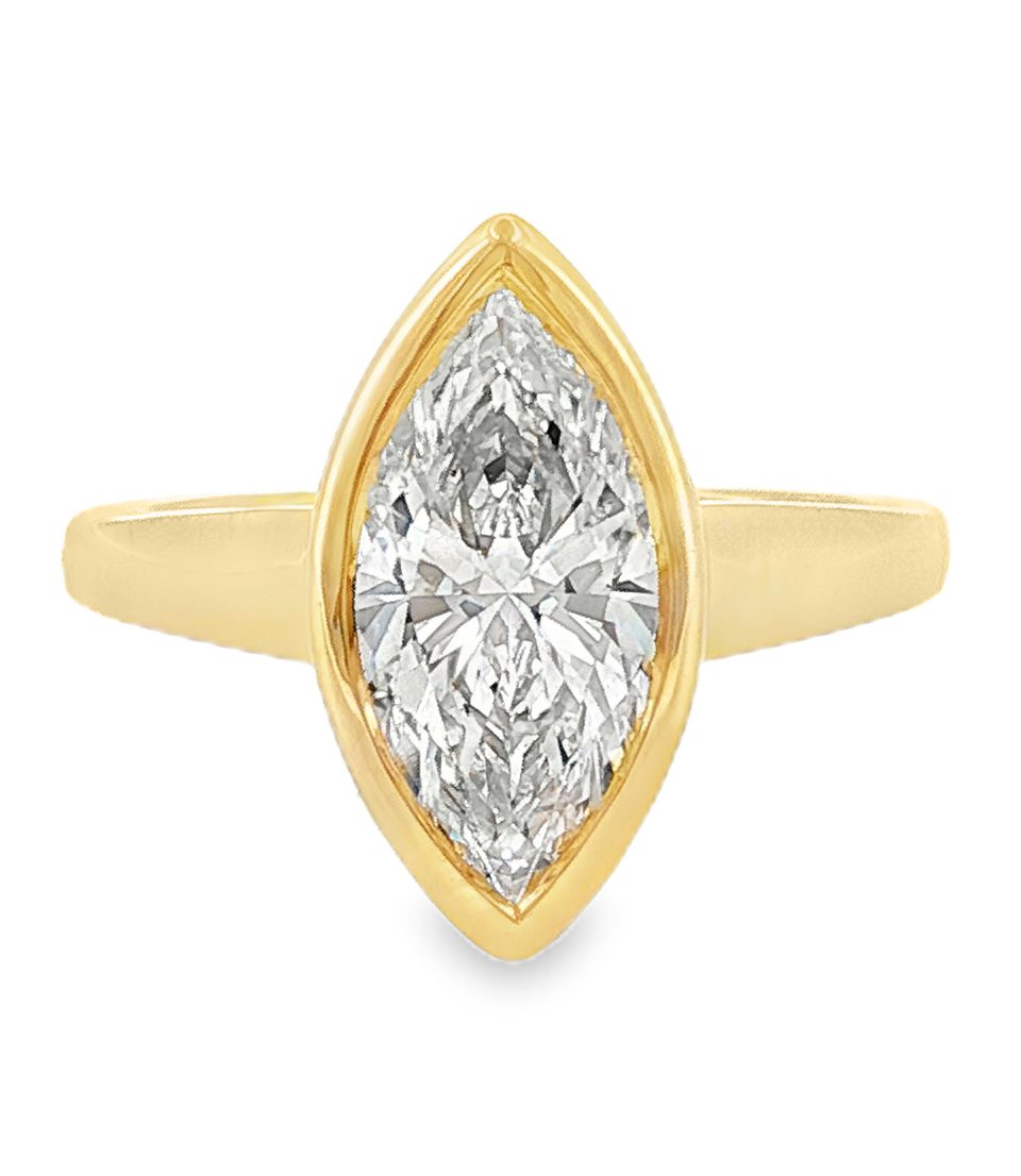 Marquise Solitaire engagement rin with lab grown diamond in 18k yellow gold